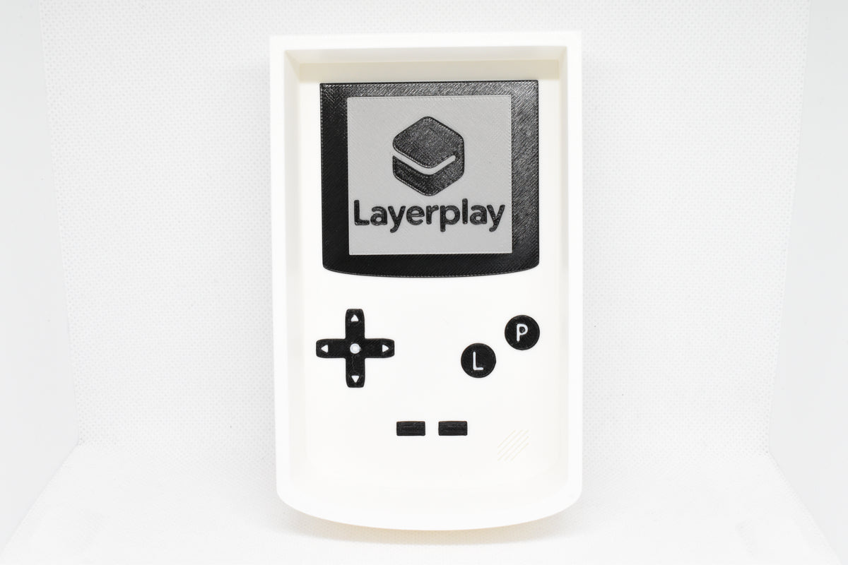 Catchall Studio BitTray V1 3D‑printed tray displayed on a white background with its console‑style screen and button layout.