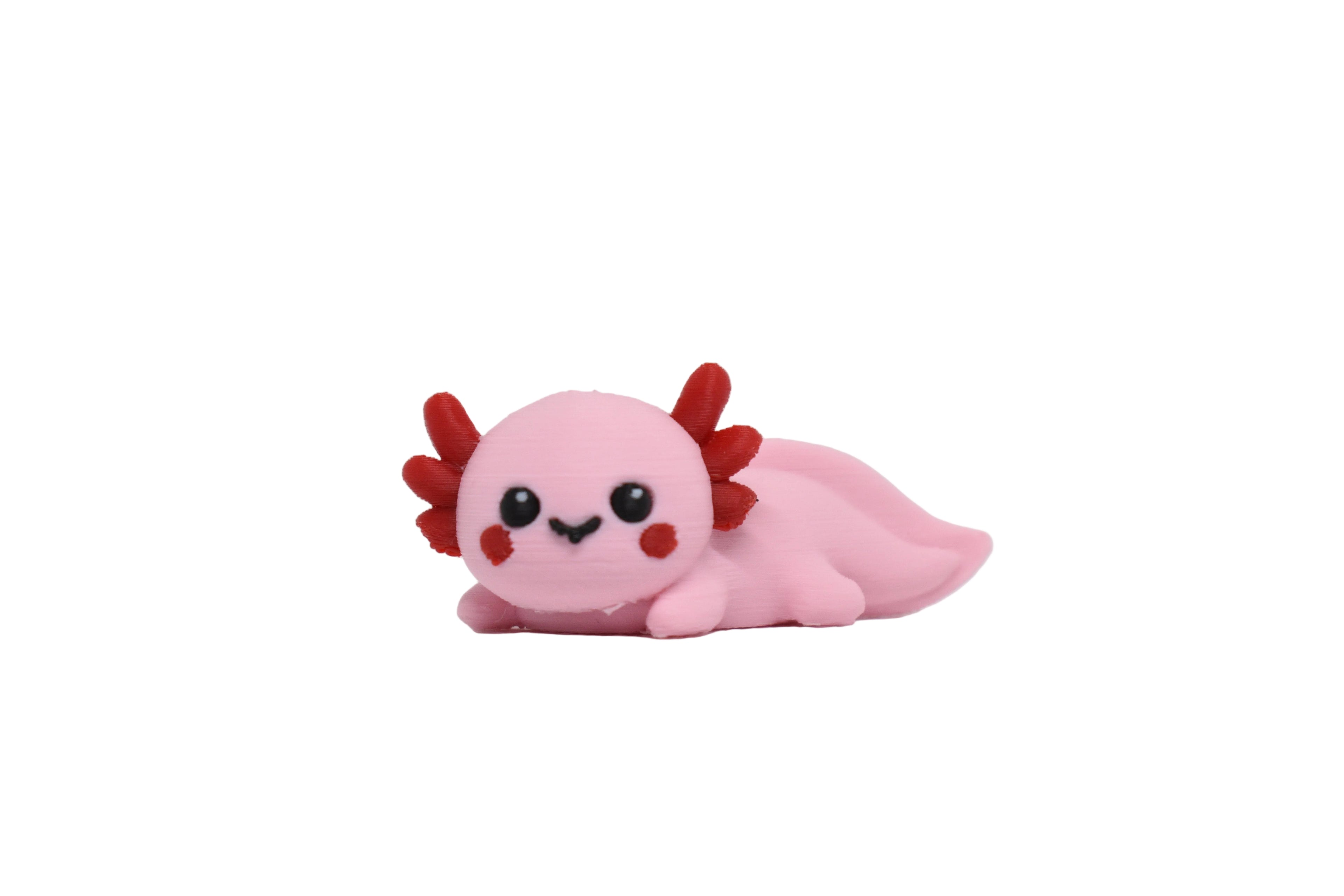 Kawaii Axolotl 3D‑printed desk toy on a white background featuring a cute smiling pink axolotl with gills and rosy cheeks.