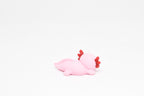 Side angle perspective showing smooth 3D layers and thickness of kawaii axolotl desk accessory figurine by LayerPlay