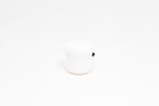 Side profile view showing round shape and smooth 3D printed finish of white kawaii marshmallow desk toy by LayerPlay