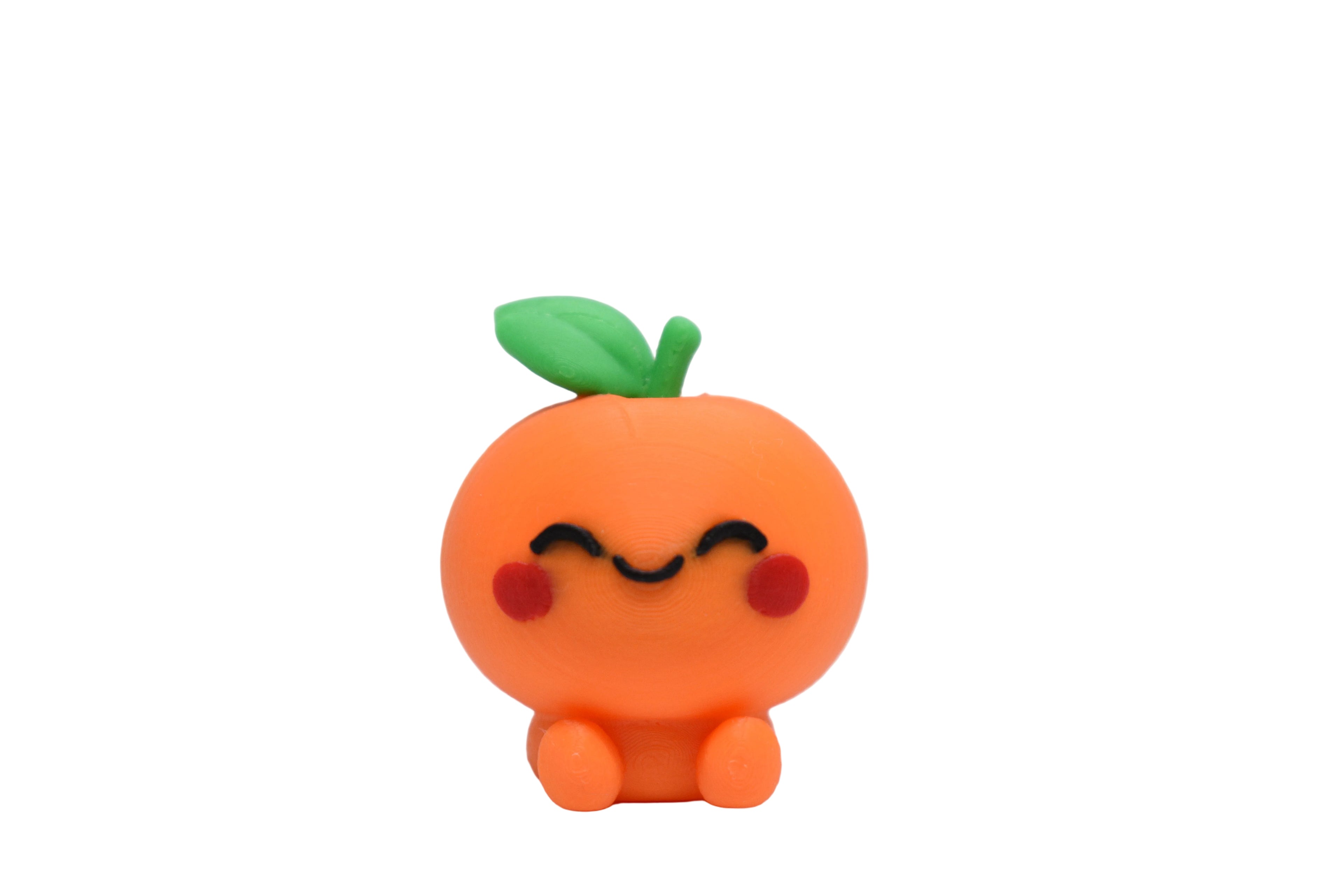 Kawaii Orange 3D‑printed desk toy on a white background featuring a cute smiling orange character with rosy cheeks.
