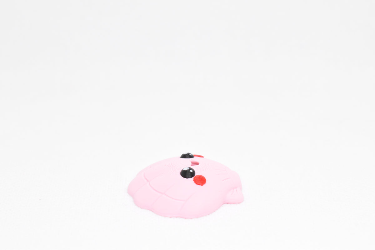 Side angle perspective showing smooth 3D layers and thickness of kawaii seashell desk accessory figurine by LayerPlay