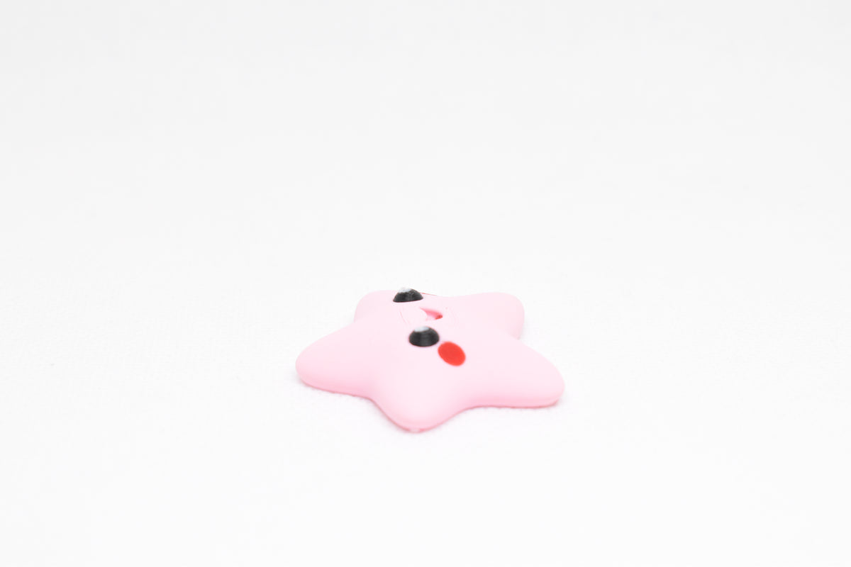 Side angle perspective showing smooth 3D layers and thickness of pink kawaii starfish desk accessory figurine by LayerPlay