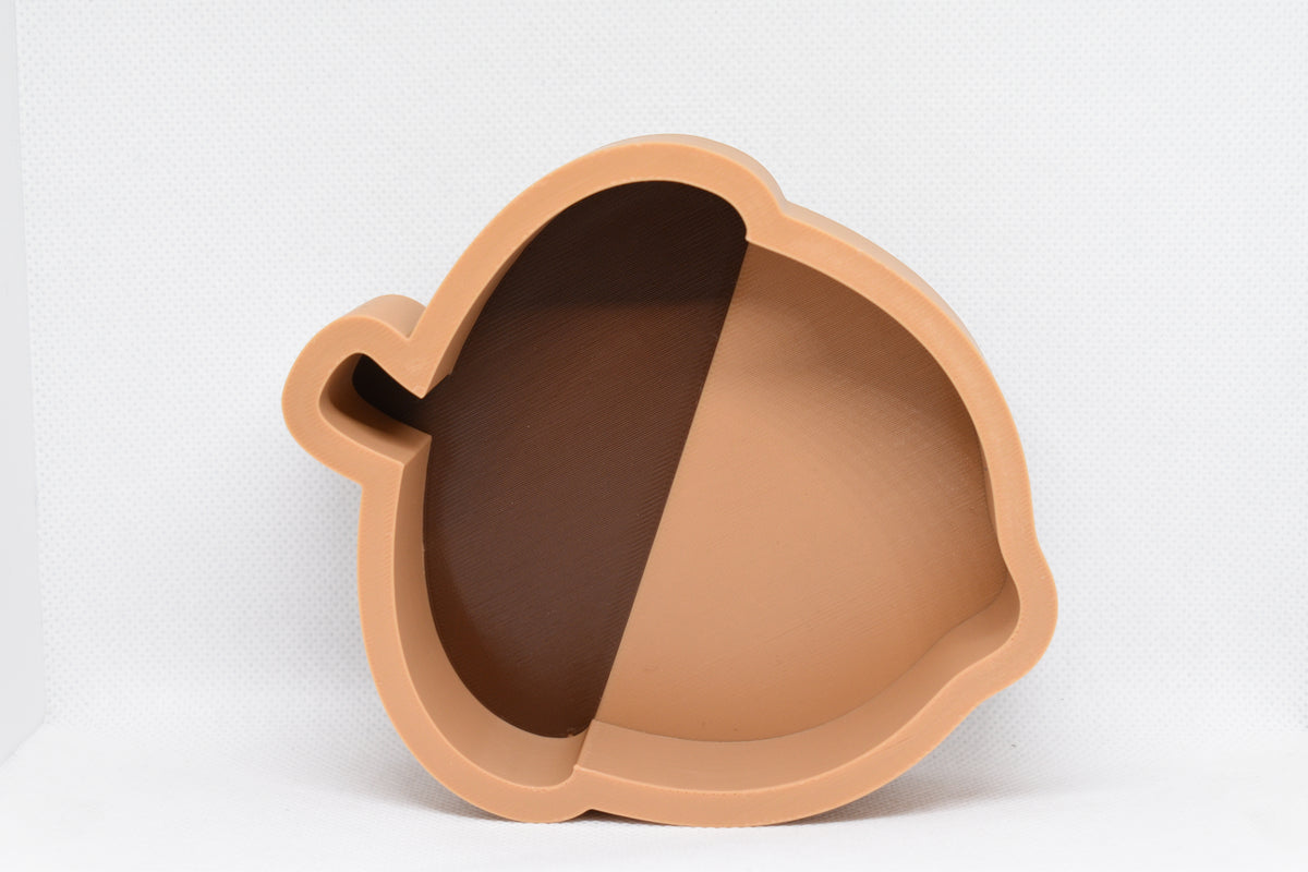 Front studio view showing 3D printed brown and tan acorn shape design of AcornBowl candy dish by LayerPlay Layertreat