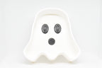Front studio view showing 3D printed white ghost silhouette with black eyes and mouth of BooBowl candy dish by LayerPlay Layertreat