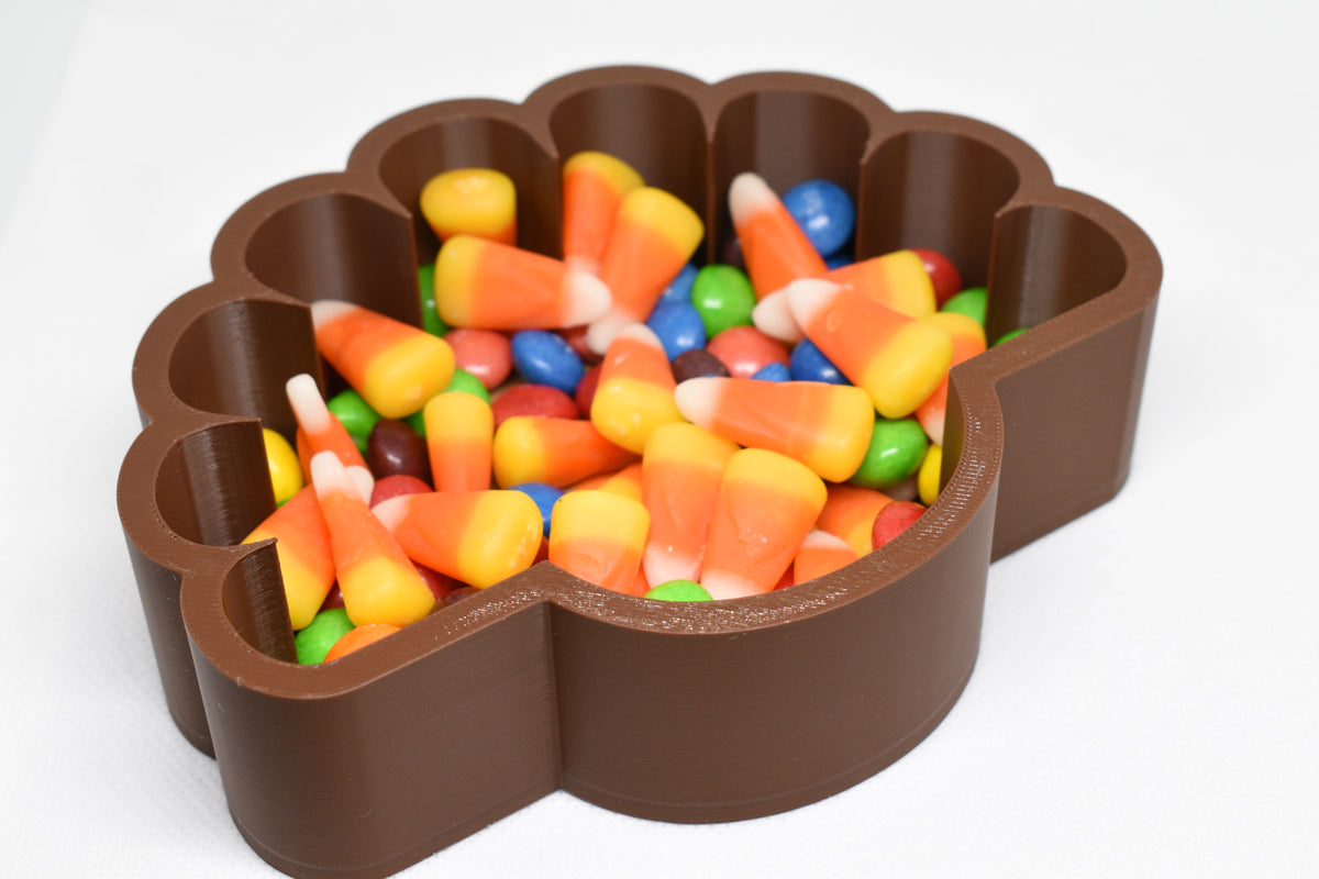 Angled top view of 3D printed brown turkey candy dish filled with candy corn and Skittles by LayerPlay Layertreat