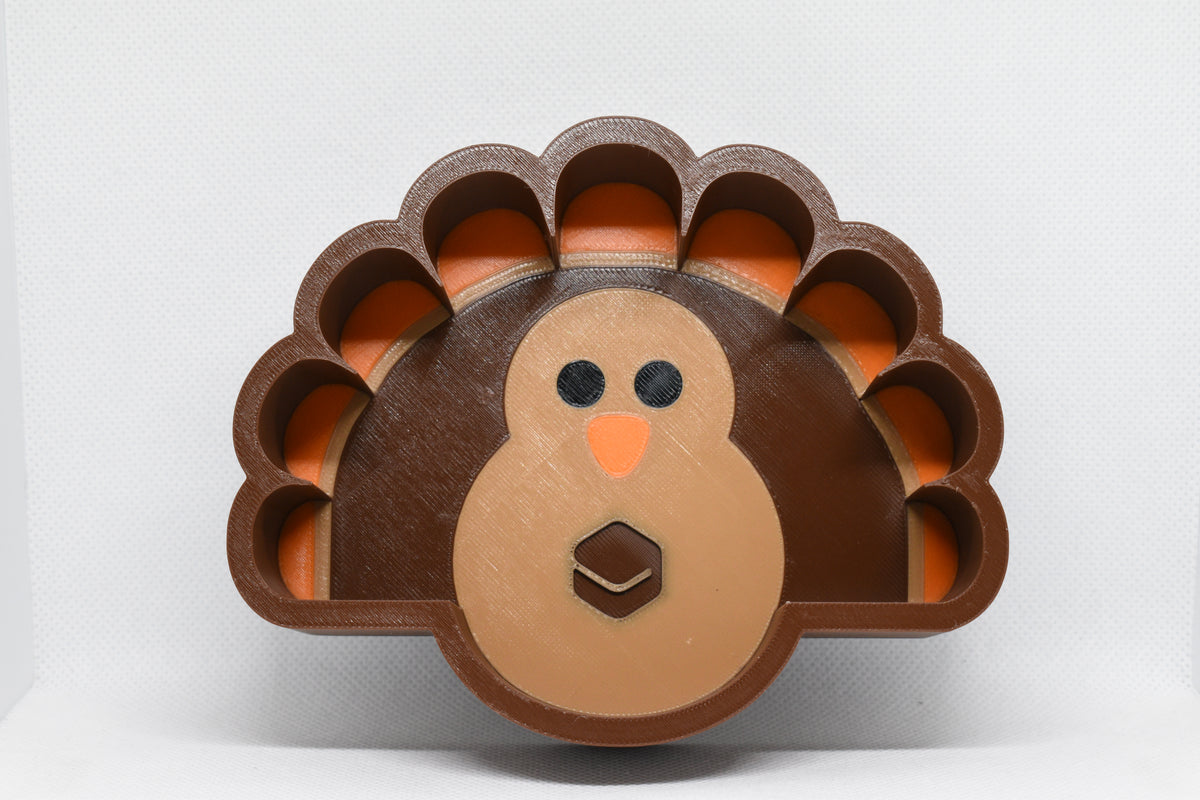 Front studio view showing 3D printed turkey face and feather tray design of GobbleBowl candy dish by LayerPlay Layertreat