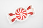 Top-down view of the Layertreat 3D printed peppermint candy dish shaped like a wrapped candy with red and white swirl accents on a clean white background.