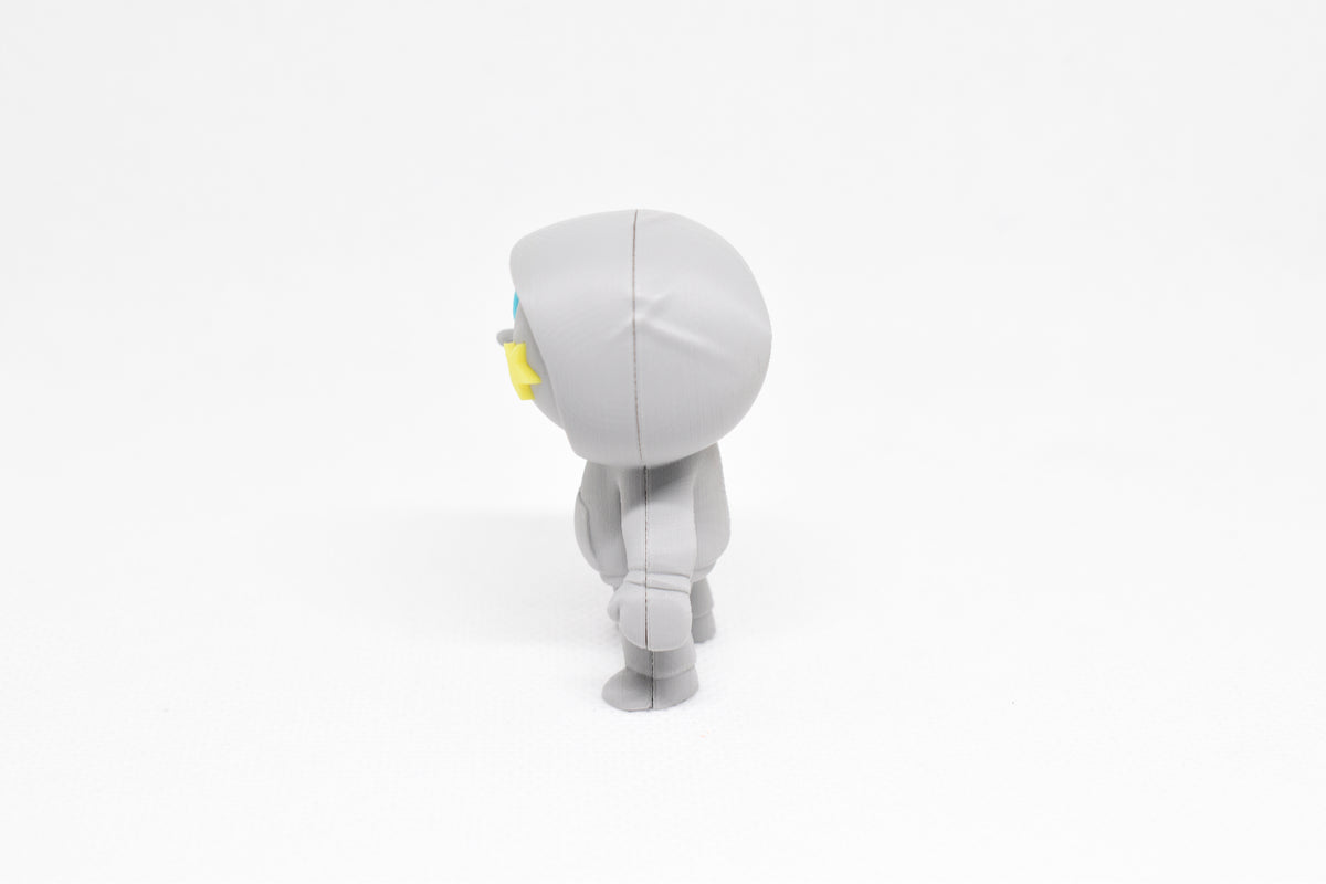 Side profile view showing raised hood profile and stance of 3D printed monomoodz drift desk figure by LayerPlay