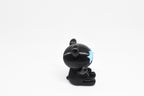 Side profile view showing black body and light blue glow in the dark star eye of 3D printed monomoodz twinkle desk figure by LayerPlay