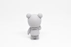 Rear view showing bun hair detail and hoodie hood of grey 3D printed monomoodz kiri collectible figure by LayerPlay