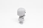 Side profile view showing bob haircut and folded arms pose of 3D printed monomoodz luma desk figure by LayerPlay