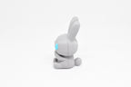 Side profile view showing round bunny tail and blue teardrop eye detail of 3D printed monomoodz nixie desk figure by LayerPlay