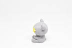 Side profile view showing sitting pose and raised star eyes of 3D printed monomoodz twinkle desk figure by LayerPlay