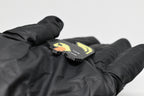 Side angle view showing 3D layered pixel detail and thickness of Hoodie Duck pixel rubber duck keychain by LayerPlay