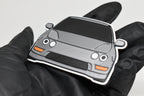 3D printed light gray Acura Integra DC2 keychain held in hand, front view detail by LayerPlay Pocket Motors