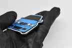 Side angle view showing 3D layered detail of light blue BMW M3 E46 keychain by LayerPlay Pocket Motors