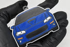 3D printed blue Chevrolet Camaro SS 4th Gen keychain held in hand, front view detail by LayerPlay Pocket Motors