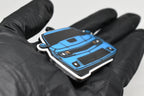 Side angle view showing 3D layered detail of light blue Chevrolet Camaro SS 5th Gen facelift keychain by LayerPlay Pocket Motors