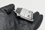 Side angle view showing 3D layered detail of light gray Chevrolet Corvette C5 keychain by LayerPlay Pocket Motors