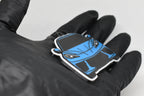 Side angle view showing 3D layered detail of light blue Chevrolet Corvette C8 keychain by LayerPlay Pocket Motors