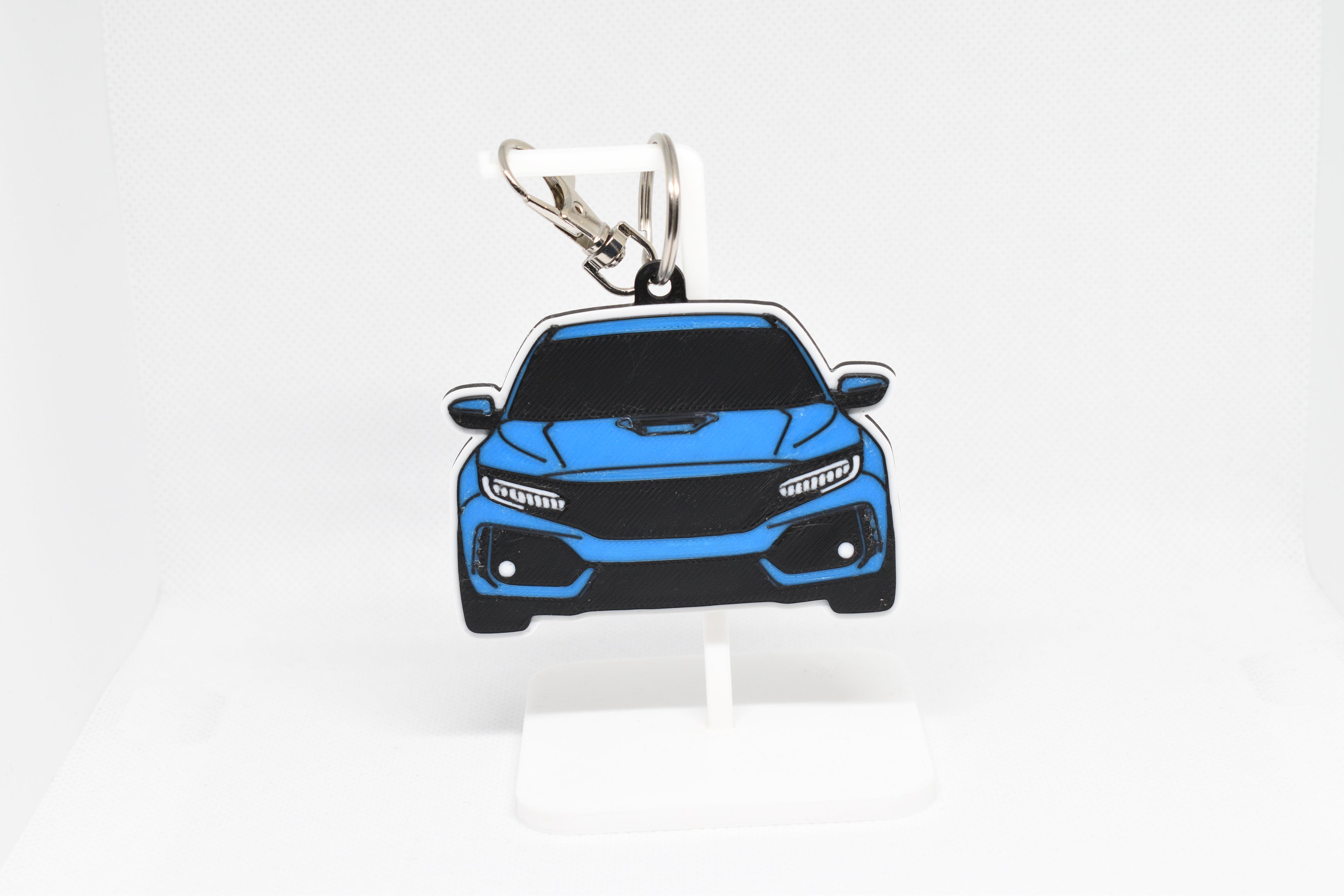 Pocket Motors Civic FK8 keychain displayed on a white stand with metal ring and clip.