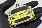 3D printed yellow Dodge Viper 5th Gen keychain held in hand, front view detail by LayerPlay Pocket Motors