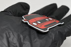 Side angle view showing 3D layered detail of red Ford Mustang S197 GT keychain by LayerPlay Pocket Motors