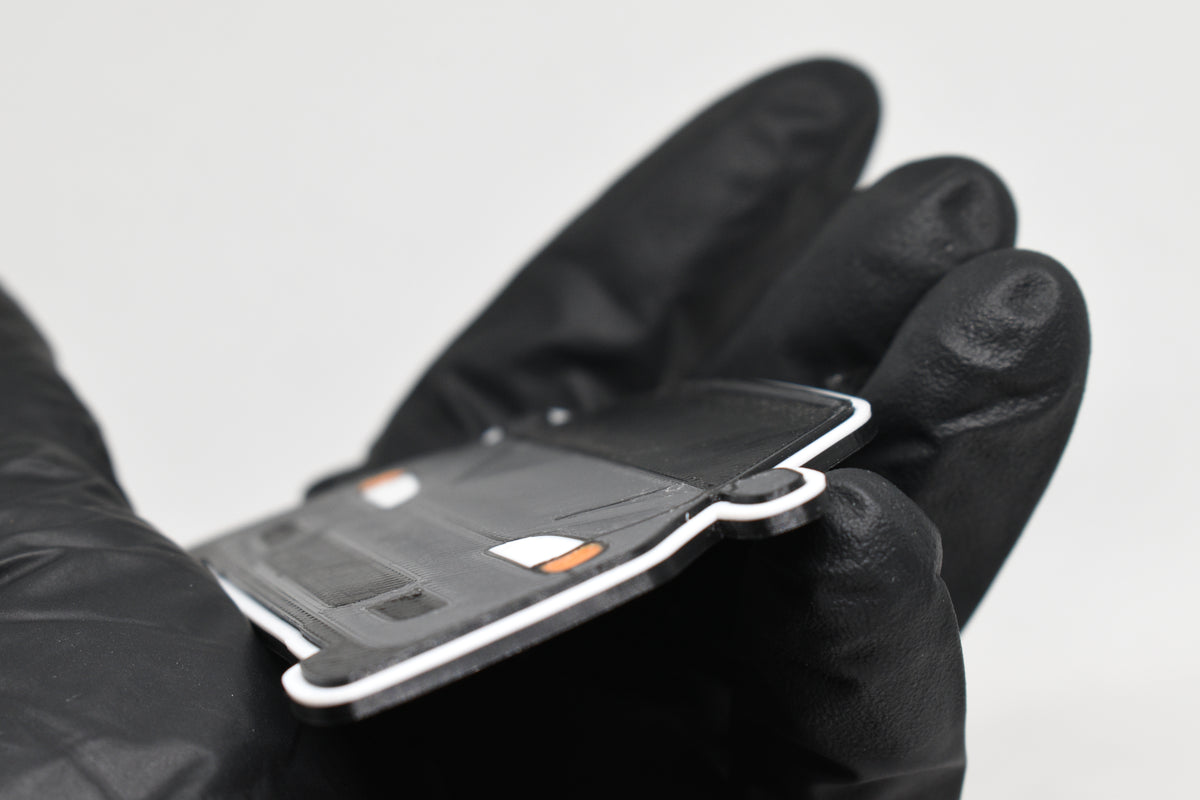 Side angle view showing 3D layered detail of space gray and black Honda Civic EG keychain by LayerPlay Pocket Motors