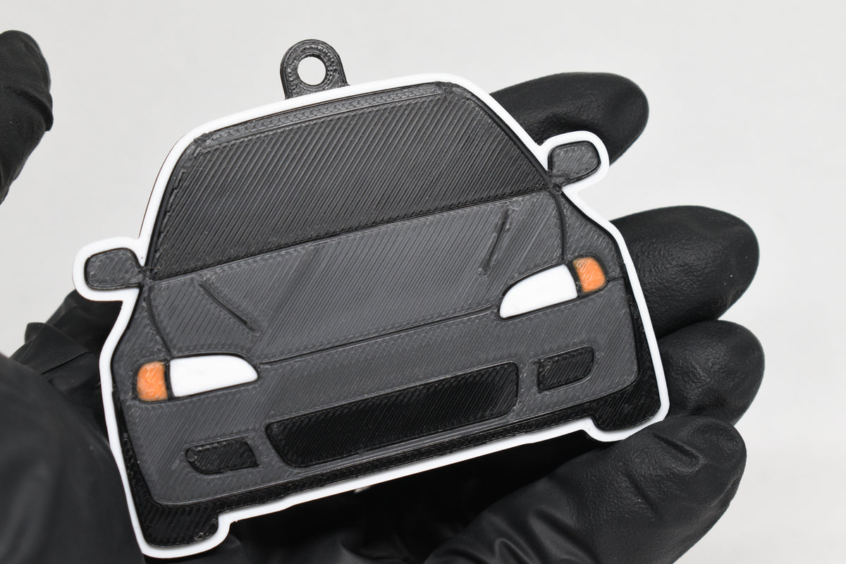3D printed space gray and black Honda Civic EG keychain held in hand, front view detail by LayerPlay Pocket Motors