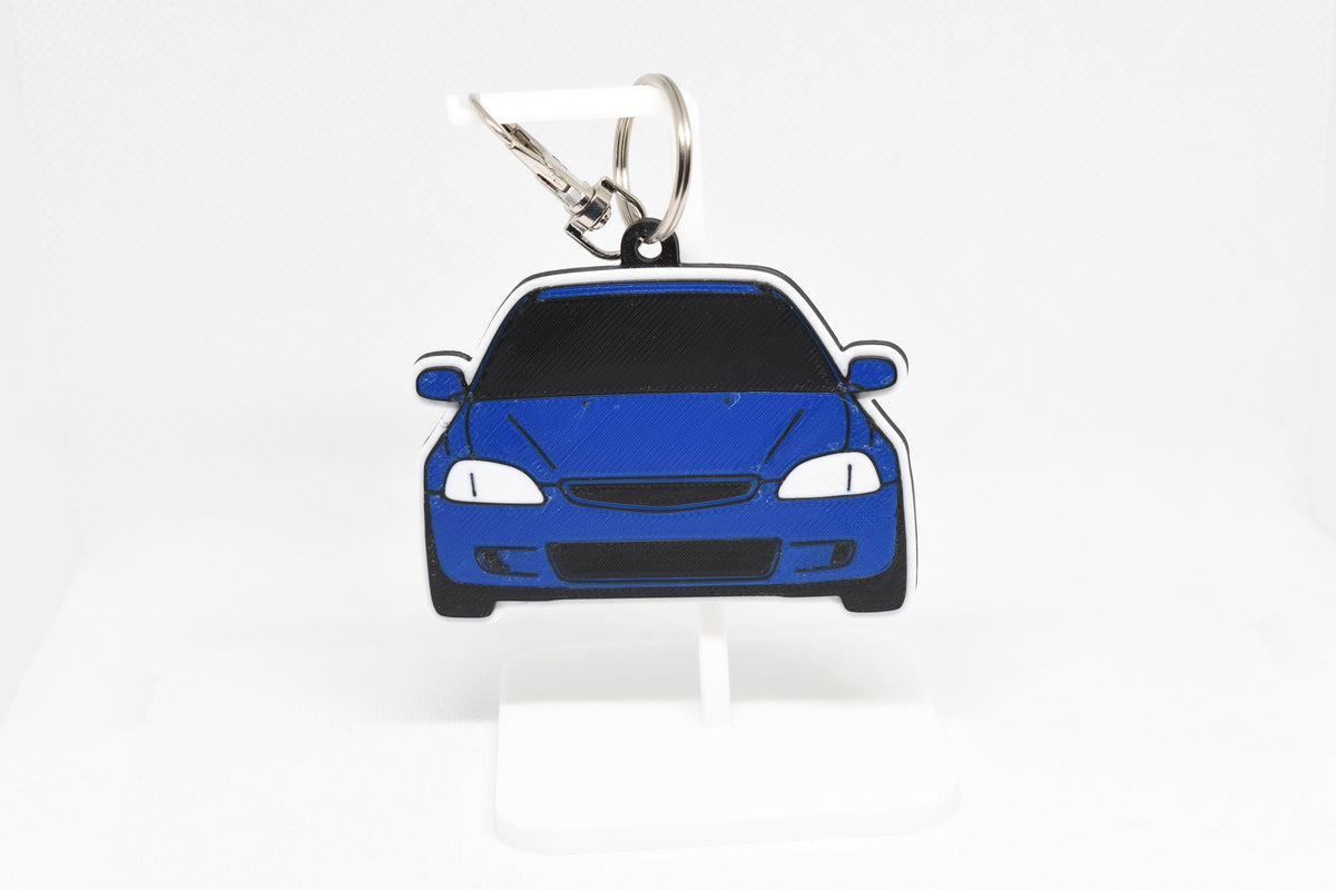 Pocket Motors Honda Civic EK keychain displayed on a white stand with metal ring and clip.