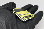 Side angle view showing 3D layered detail of yellow JDM Honda Integra DC2 keychain by LayerPlay Pocket Motors