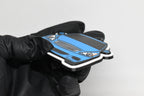 Side angle view showing 3D layered detail of light blue Infiniti G37 Coupe keychain by LayerPlay Pocket Motors