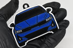 3D printed blue Kia K5 keychain held in hand, front view detail by LayerPlay Pocket Motors