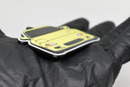 Side angle view showing 3D layered detail of yellow Mazda RX-7 FD keychain by LayerPlay Pocket Motors