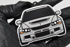 3D printed light gray Mitsubishi Lancer Evolution 9 keychain held in hand, front view detail by LayerPlay Pocket Motors