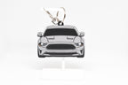 Pocket Motors Mustang S550 facelift keychain displayed on a white stand with metal ring and clip.