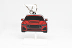 Pocket Motors Mustang S650 keychain displayed on a white stand with metal ring and clip.