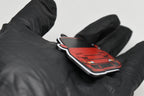 Side angle view showing 3D layered detail of red Nissan 240SX S13 keychain by LayerPlay Pocket Motors