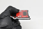 Side angle view showing 3D layered detail of red Nissan 370Z keychain by LayerPlay Pocket Motors
