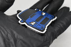 Side angle view showing 3D layered detail of blue Blobeye Subaru WRX STI keychain by LayerPlay Pocket Motors