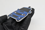 Side angle view showing 3D layered detail of blue Subaru WRX STI GR keychain by LayerPlay Pocket Motors