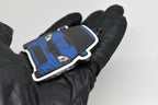 Side angle view showing 3D layered detail of blue Hawkeye Subaru WRX STI keychain by LayerPlay Pocket Motors