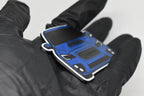 Side angle view showing 3D layered detail of blue Subaru WRX STI VA keychain by LayerPlay Pocket Motors