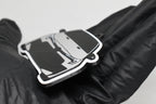 Side angle view showing 3D layered detail of light gray Toyota GR Corolla facelift keychain by LayerPlay Pocket Motors