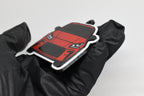 Side angle view showing 3D layered detail of red Toyota GR86 keychain by LayerPlay Pocket Motors