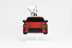 Layerplay Pocket Motors Toyota GR86 3D printed keychain displayed on a white stand.