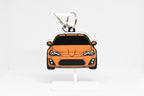 Layerplay Pocket Motors Toyota GT86 3D printed keychain displayed on a white stand.