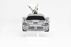 Pocket Motors Viper 4th Gen keychain displayed on a white stand with metal ring and clip.