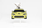 Pocket Motors Viper 5th Gen keychain displayed on a white stand with metal ring and clip.